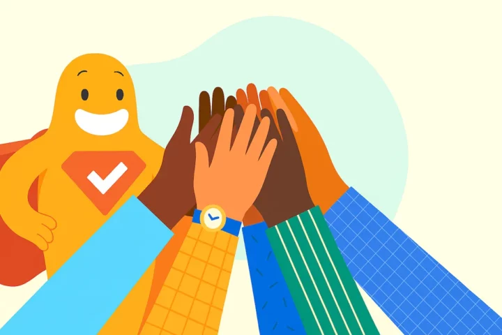 Illustration of diverse hands coming together for a group high-five, with the SurveyLegend mascot smiling beside them, symbolizing diversity, equity, and inclusion.